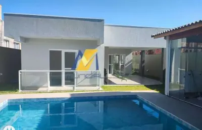 Linda casa com 239 m²  em condomínio à venda com 3 quartos e 1 suíte