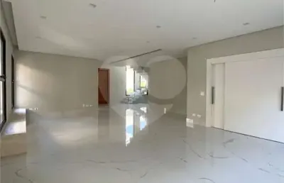 Casa em condomínio fechado com 4 quartos à venda na avenida honório alvares penteado, 1100, tamboré, santana de parnaíba, 420 m2 por r$ 6.800.000