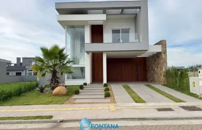 Casa com 3 dormitórios à venda, 237 m² por r$ 1.695.000,00 - terras alpha - gravataí/rs