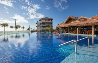 Situado a 200 metros da praia da marambaia, o manhattan beach riviera oferece acomodações, restaurante, área de praia privativa, instalações para esportes aquáticos e piscina ao ar livre.