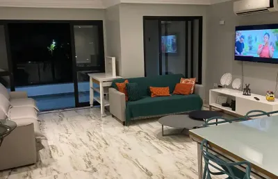 Apartamento completo perto da praia com sacada e moderno !!
