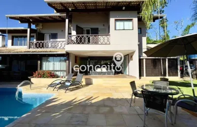 Casa com 3 suítes e piscina aquecida em loteamento prestigiado!
