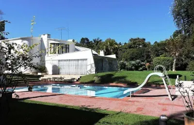 Casa com linhas moderna, ventilada e sofisticada no jardim colonial - granja viana