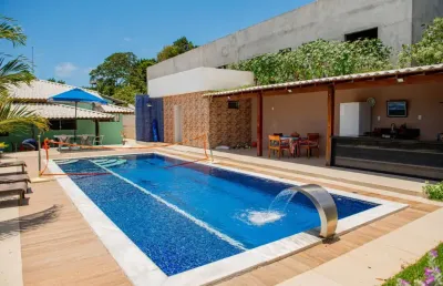 Casa em condomínio fechado com 4 quartos à venda na Rua A, 789, Barra do Jacuípe, Camaçari