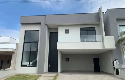 Sobrado com 4 suítes e piscina condomínio santorini