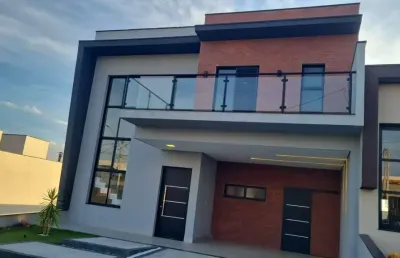 Sobrado com 3 suítes e piscina condomínio evidencias