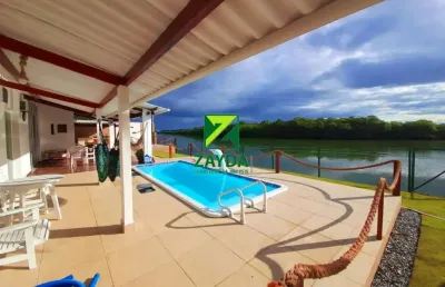 Casa na beira rio, com 03 quartos e área total de 2.000 m², em barra de são joão.