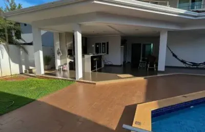 Casa de condomínio à venda, sendo 4 suítes de 432,00 m² no jardins florença
