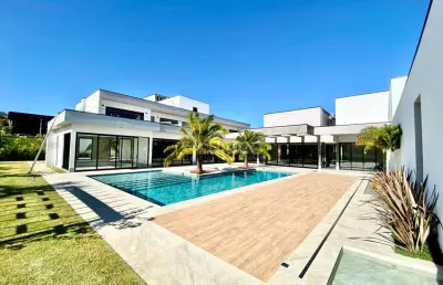 Maravilhosa mansão, altíssimo padrão, oferece luxo, conforto e lazer que você busca!