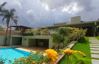 Casa com 4 suítes para locação condomínio marambaia