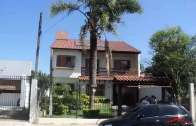 Casa com 4 quartos à venda na rua landel de moura, 2739, tristeza, porto alegre por r$ 1.600.000