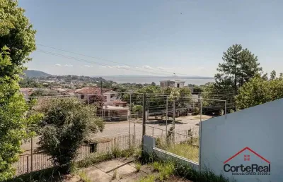 Casa com 3 quartos à venda na avenida leonardo carlucci, 140, espírito santo, porto alegre por r$ 550.000