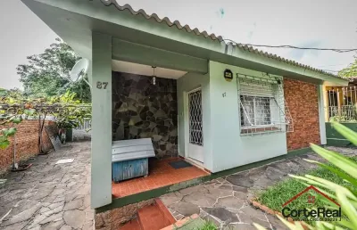Casa com 3 quartos à venda na acesso das tulipas, 87, santa tereza, porto alegre por r$ 383.000