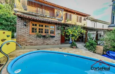 Casa com 4 quartos à venda na das figueiras, 108, santa tereza, porto alegre por r$ 650.000
