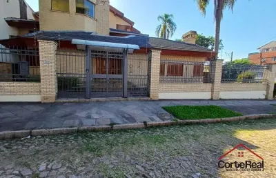 Casa com 4 quartos à venda na rua paissandu, 361, partenon, porto alegre por r$ 2.900.000