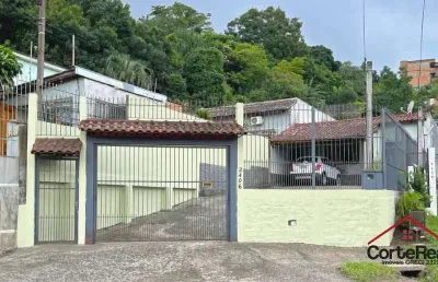 Casa com 3 quartos à venda na avenida vicente monteggia, 2406, vila nova, porto alegre por r$ 495.000