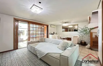 Casa com 3 quartos à venda na avenida coronel marcos, 2171, pedra redonda, porto alegre por r$ 670.000