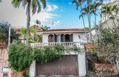 Casa com 3 quartos à venda na rua oscar tollens, 170, santa tereza, porto alegre por r$ 450.000