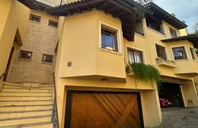 Casa com 3 quartos à venda na rua landel de moura, 999, tristeza, porto alegre por r$ 1.390.000