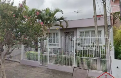 Casa com 3 quartos à venda na wolfrid, 65, petrópolis, porto alegre por r$ 699.000