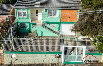 Casa com 4 quartos à venda na rua álvaro osimo caetano, 106, santa tereza, porto alegre por r$ 550.000