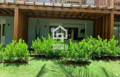 Apartamento térreo em condomínio pé na areia em praia do forte bahia