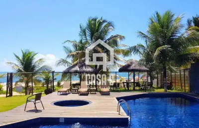 Apartamento duplex em condomínio pé na areia itacimirim bahia
