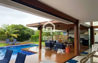 Casa alto padrão 06 suítes a venda condomínio piscinas naturais em praia do forte bahia