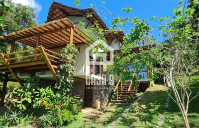 Casa alto padrão a venda na beira da lagoa aruá 7km de praia do forte bahia
