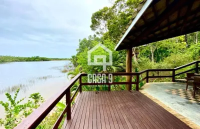 Casa a venda na beira da lagoa aruá 7km de praia do forte bahia