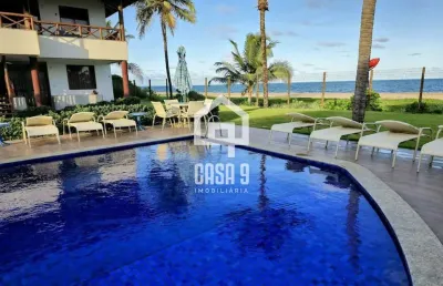 Apartamento mobiliado a venda com 2 suítes pé na areia em itacimirim bahia