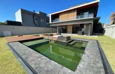 Sobrado com 4 dormitórios à venda, 360 m² por r$ 4.770.000,00 - condomínio reserva do paratehy - são josé dos campos/sp