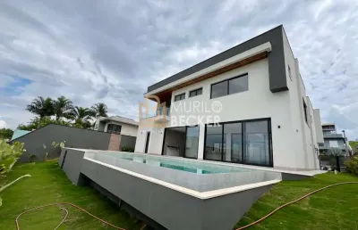 Venda casa de 4 quartos condomínio reserva do paratehy bairro urbanova