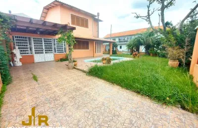 Casa 4 dormitórios à venda no bairro centro com 160 m² de área privativa - 3 vagas de garagem