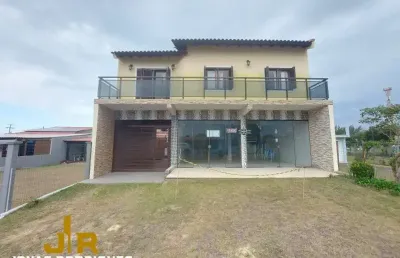 Casa 3 dormitórios à venda no bairro nova tramandaí com 180 m² de área privativa - 1 vaga de garagem