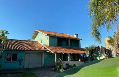Casa 4 dormitórios à venda no bairro zona nova com 130 m² de área privativa - 2 vagas de garagem