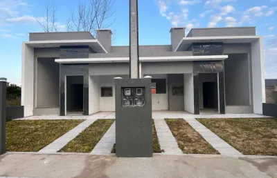 Casa 2 dormitórios à venda no bairro nova tramandaí com 70 m² de área privativa - 1 vaga de garagem