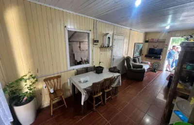 Casa 2 dormitórios à venda no bairro centro com 110 m² de área privativa