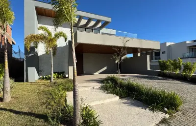Sobrado 3 suites com piscina a venda condominio arborais