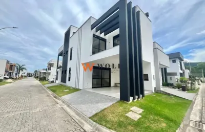 Casa em condomínio fechado com 3 quartos à venda na avenida wilson castelo branco, 292, beira rio, biguaçu por r$ 1.089.000