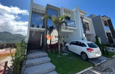Casa em condomínio fechado com 3 quartos à venda na avenida deltaville, 132, beira rio, biguaçu por r$ 1.090.000