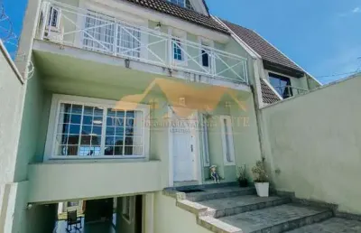 Casa com 4 quartos à venda na rua leôncio derosso, 1312, xaxim, curitiba por r$ 1.200.000