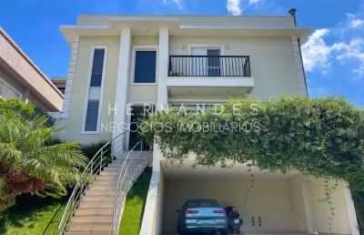 Casa neoclássica à venda com 3 suítes, 4 vagas e lazer completo, em alphaville