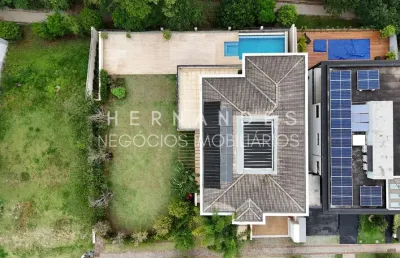 Itahyê - maravilhosa casa em 2 lotes, com vista permanente para a mata nativa em alphaville - sp