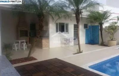 Sobrado para aluguel com 4 suítes, piscina e móveis planejados em condominio