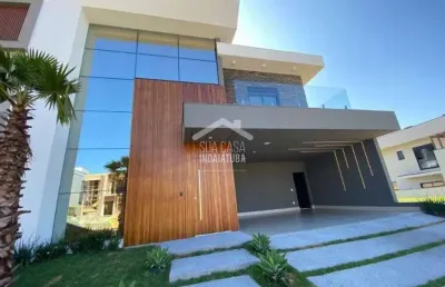 Sobrado moderno em condomínio fechado com 4 suítes e piscina
