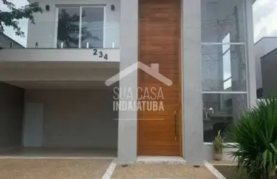 Sobrado com 3 suítes e piscina em condomínio fechado