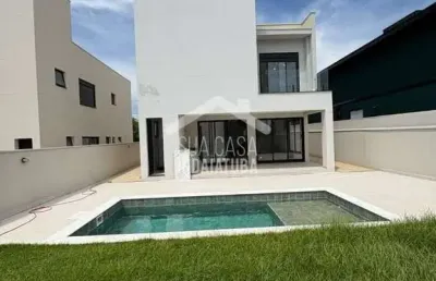 Sobrado novo com 3 suítes, escritório e piscina em condomínio fechado em indaiatuba
