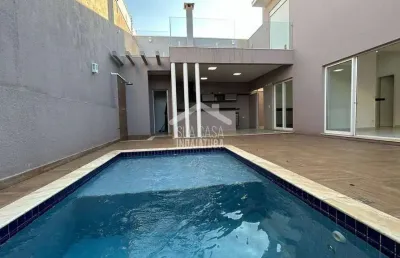 Sobrado com 3 suítes e piscina no condomínio maria dulce