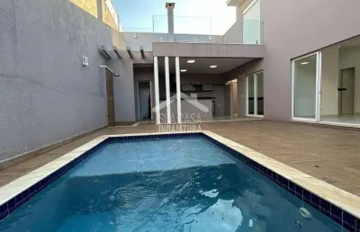 Sobrado com 3 suítes e piscina no condomínio maria dulce